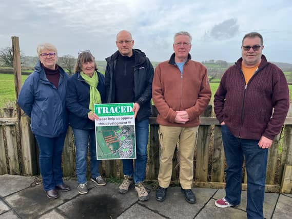 Campaigners from TRACED (Tavistock Residents Against more Callington Road Estate Development) in front of the field being proposed for homes. Picture by Alison Stephenson
