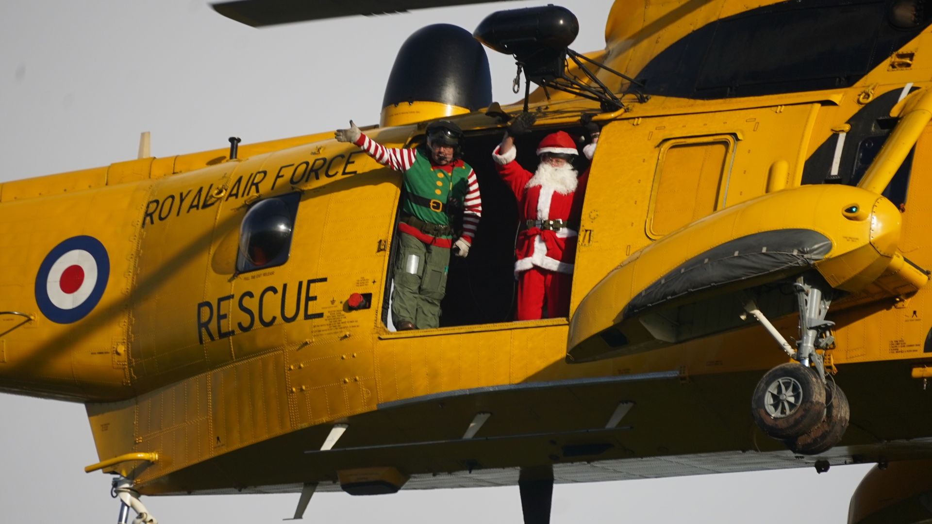 Santa soars over North Devon in his Sea King helicopter to spread ...
