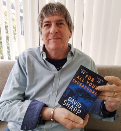 David with his book. Credit: David Sharp