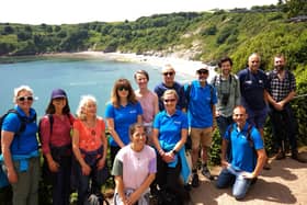 South West Coast Path Association volunteers, partners, and team members on a walk in Torbay, Summer 2024