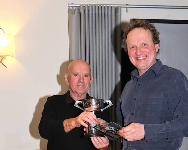 Simon Ashley receiving the Battery Maintenance Cup from Paul Morris (c)
