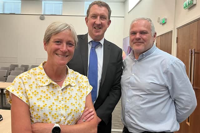The Queen's Head managers Jo and Trevor Huckle with leading director of J D Wetherspoons Nigel Connor (centre)