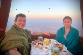 Michael Hollinson and daughter Darcy in a hot air balloon over North Africa