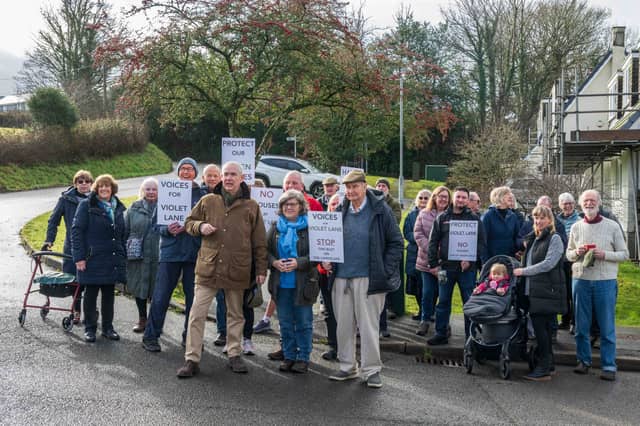 A recent protest over housing at Violet Lane, Tavistock with MP Geoffrey Cox