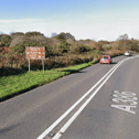 A motorcyclist injured in a collision near the turning for Buckland Abbey has died