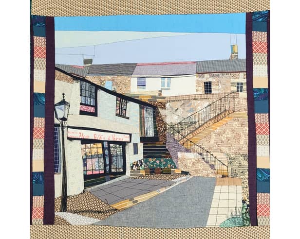 Wall hanging of Katherine's original shop on Paddon's Row, Moor Silks and Quilts