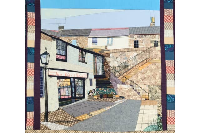 Wall hanging of Katherine's original shop on Paddon's Row, Moor Silks and Quilts