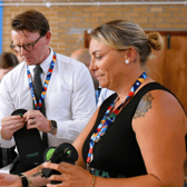 Leaders at Tavistock College using the Yondr lockable pouches