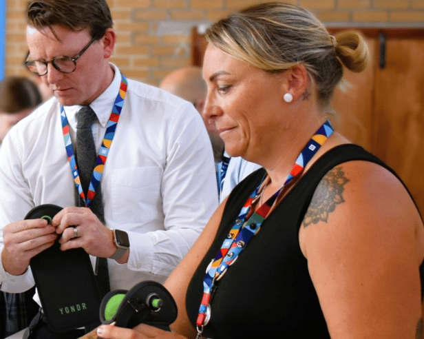 Leaders at Tavistock College using the Yondr lockable pouches