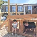 Jacob Poole, owner of Aardvark Haulage and son Theo, who attends Hennock pre-school
