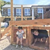 Jacob Poole, owner of Aardvark Haulage and son Theo, who attends Hennock pre-school