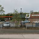 A woman suffered minor injuries after an assault near McDonald’s and Sainsbury’s at Penn Inn