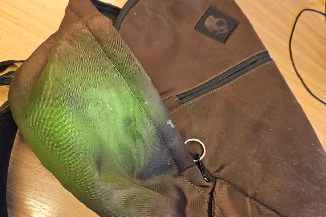 A bag tagged with Smart Water