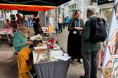 Museum Curator Joanna Eccles talks with passers-by