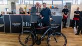 Julian Tagg presents Gary Caldwell with his new bike