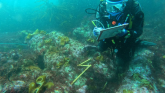 Diver recording cannon on a historic shipwreck &copy; Wessex Archaeology