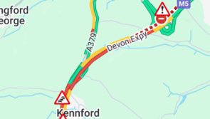 Live: Delays on A38 after tractor and bike collision
