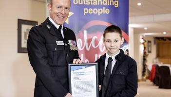 South Devon Police Commander Roy Linden presenting a commendation to Arthur Good (D&C Police)