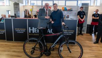 Julian Tagg presents Gary Caldwell with his new bike