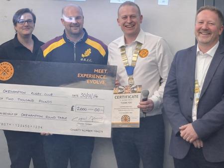 Okehampton District Round Table members present a donation to Okehampton Rugby Club (Image- ODRT)