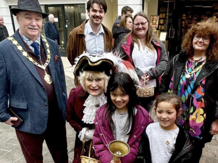 Councillors Colin Parker, Cllr Alex Hall, Cllr Amanda Inneson and community members Olivia and Elsie join in activities in the town centre