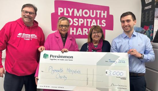 Persimmon presenting the cheque Plymouth Hospitals Charity (Image- Persimmon)