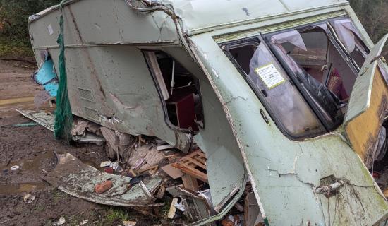 A caravan has been dumped in woods near Gara Bridge in South Devon (Image courtesy: Bradley Gerrard)