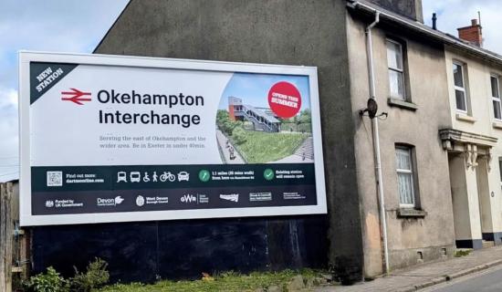 A new billboard to promote Okehampton Interchange station went up on East Street (Image credit- Nettl/Devon & Cornwall Rail Partnership)