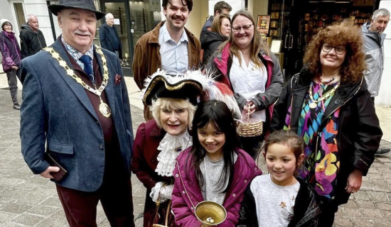 Councillors Colin Parker, Cllr Alex Hall, Cllr Amanda Inneson and community members Olivia and Elsie join in activities in the town centre
