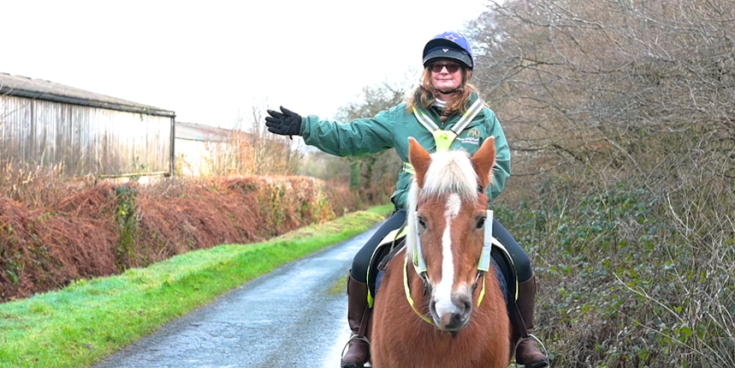 Pictured: Rider from Mare and Foal Sanctuary demonstrating hand signals