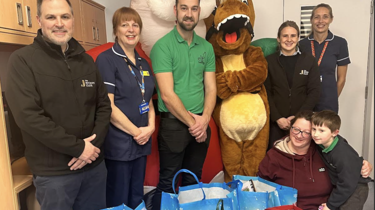 Pictured are Jack Parkinson, Louise Taylor, Gary Moore, Dexter, Hannah Lastead, Janine Roberts, Lottie Birchall and Freddie (age 5)