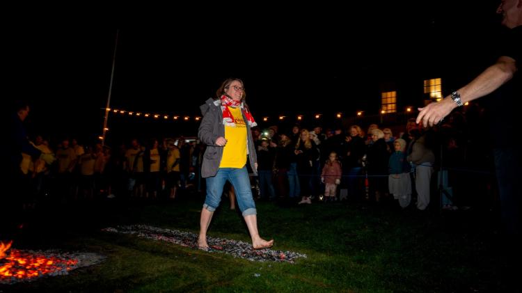 Kathryn during her firewalk Image- Tigerbond