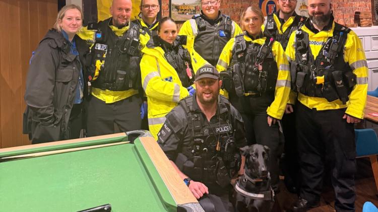 Police and drugs dog, Jasper, proactively searching pubs in Plymouth (Image- D&C Police)