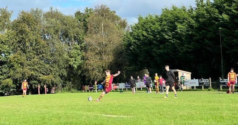 Simmons slots a kick