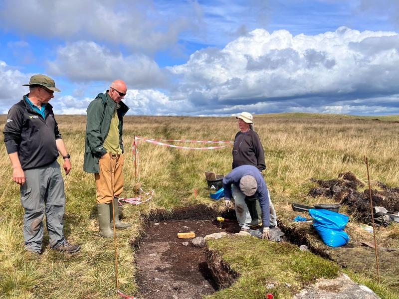 Archaeological excavation reveals paved surface at Dartmoor stone row