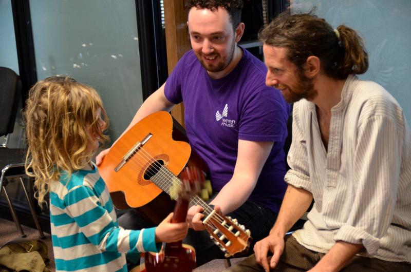 Jon Dyer of Wren Music with Guitar