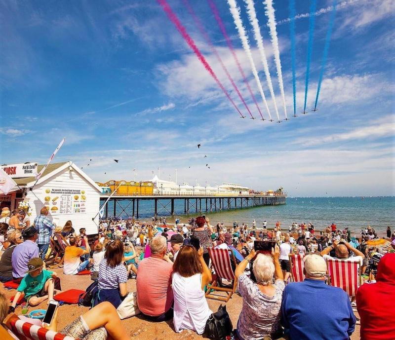 Thousands watch the spectacular Red Arrows Pic English Riviera Airshow