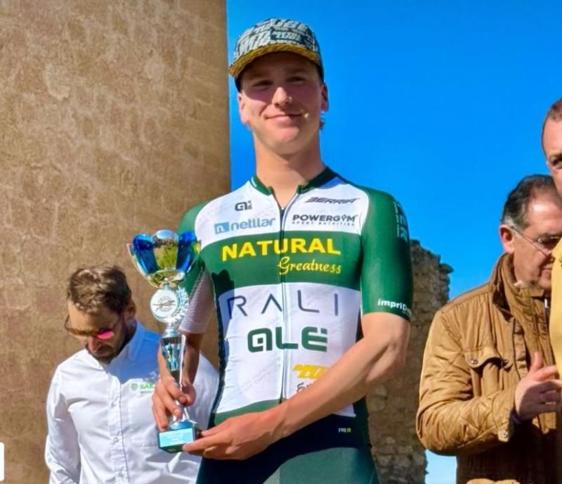 Ewan Warren holding the trophy