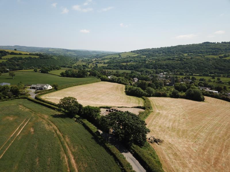 Drone shot looking over Dunsford and the reservior Credit- Alex O'Connor, Squirrel Design 