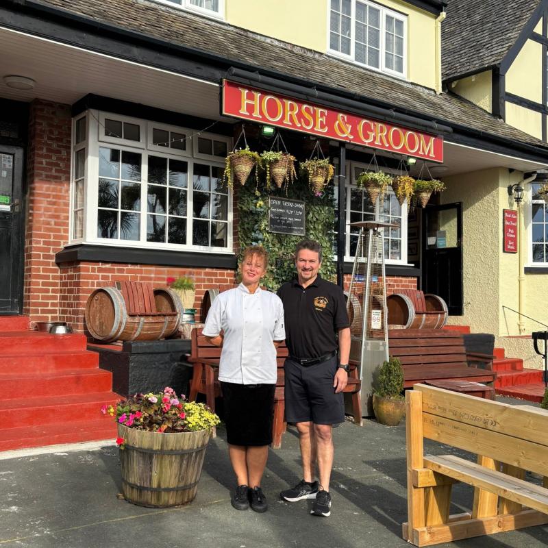 Landlords Dawn and Olly outside the Horse and Groom in Bittaford Credit- Dawn Michelin