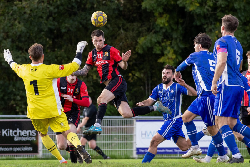 Lambs forward Jack Crago heading the ball toward goal Credit- Dave Crawford