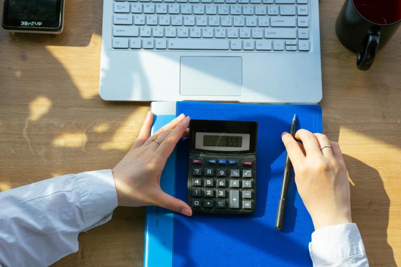 Person using a calculator Credit- Pexels