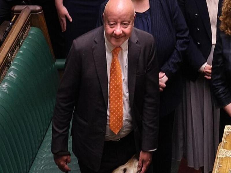 Steve Darling in the Commons with guide dog Jennie. Pic House of Commons Creative