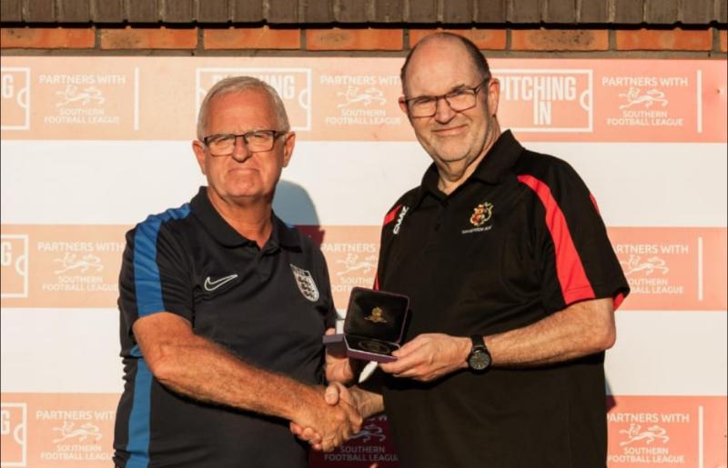 Phil recieving the 50 years of service from FA representative Tom Sampson