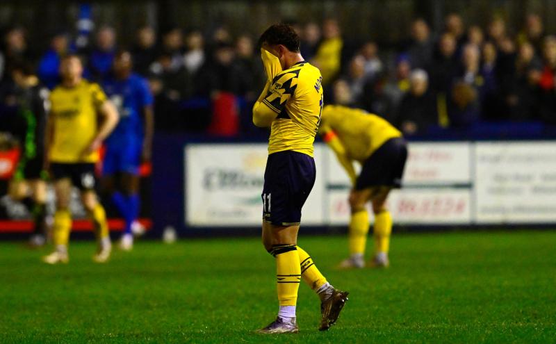 Glum faces for Torquay United. Pic from PPAUK