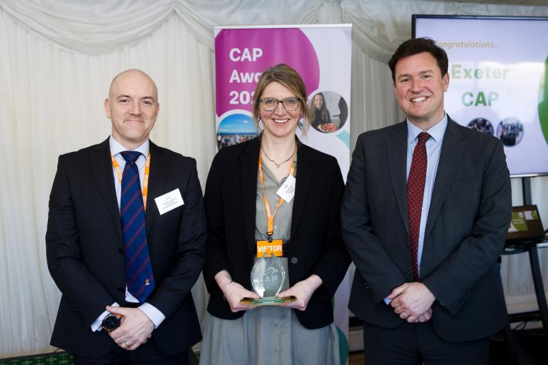 Inspector Nathan Johnson and Nicola Wheeler received the award from Exeter MP Steve Race