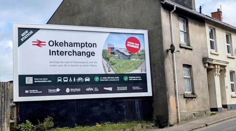 A new billboard to promote Okehampton Interchange station went up on East Street (Image credit- Nettl/Devon & Cornwall Rail Partnership)