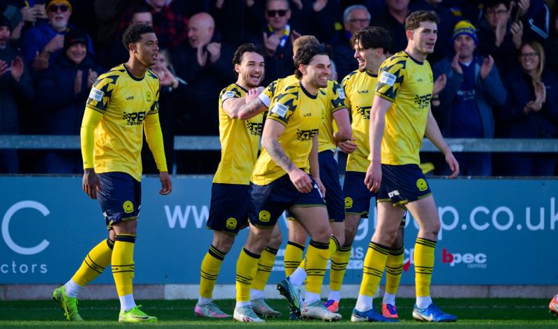 Smiles of victory for Torquay United. Pic from PPAUK