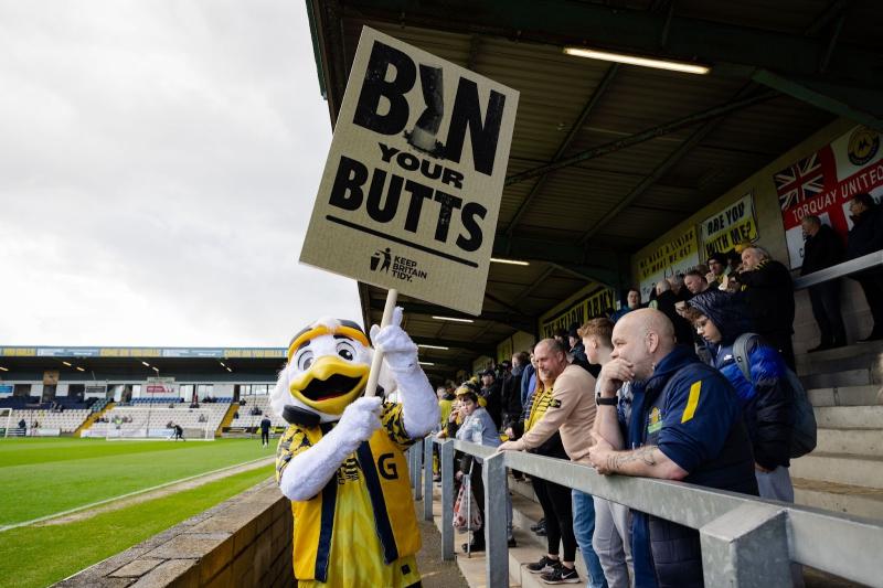 Torquay United and mascot Gilbert backing Bin Your Butts campaign
